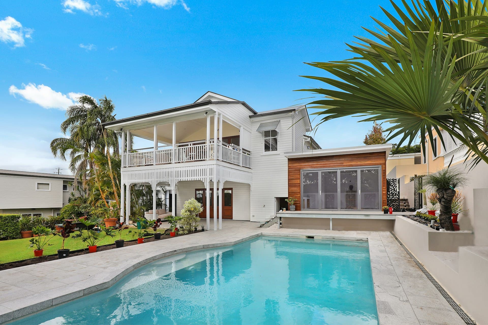 A light-filled, fully renovated open-plan home interior by Mendoza Construction & Remodeling